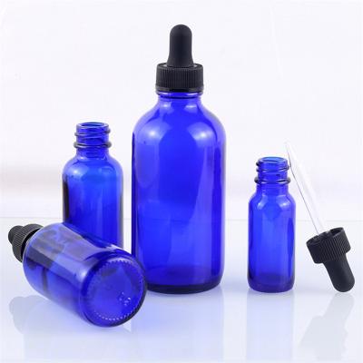 China 5ml 10ml 15ml 20ml 30ml 50ml 100ml Amber Clear Blue Glass Round Dropper Bottle Essential Oil Cosmetic Bottle for sale