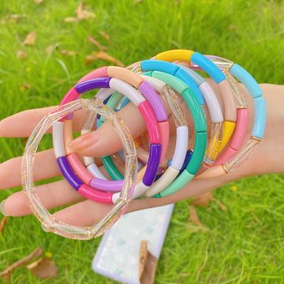 China 2021 New Design FASHIONABLE Colorful Resin Acrylic Bamboo Curved Transparent Girl 6mm Small Tube Bead Stack Bangle Bracelets Women Bracelets for sale