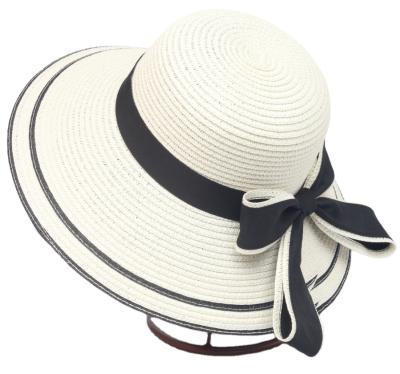 China New parent-child beach hat bow eco-friendly wholesale straw hat wide overflowed super cheap hat women's solid color Sun wholesale for sale