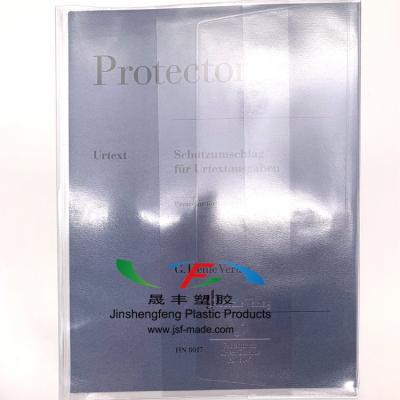 China Book Cover PVC Transparent Waterproof Book Cover Embossed Logo Notebook Protector for sale