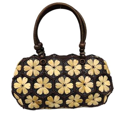 China Luxury Handcrafted Vintage Coconut Shell Material Ladies Handbags for sale