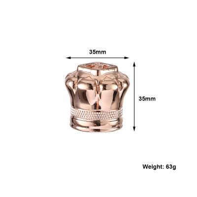 China Non Puddle Top Design Make Your Own Brand Perfume Lids Luxury Zinc Alloy Crown Bottle Cap for sale