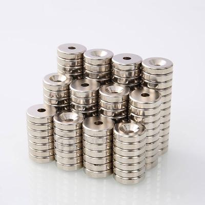 China Super Powerful Round Magnet Industrial Magnetic Materials 18*4-5mm Neodymium Magnet With Hole for sale