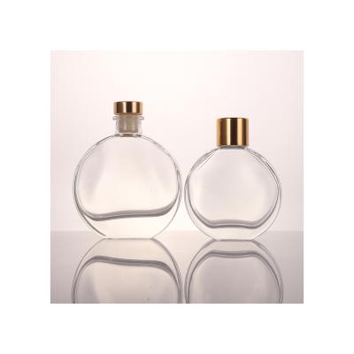 China New Clear 55ml Color Cosmetic Aromatherapy Bottle Glass Oval Perfume Bottle for sale