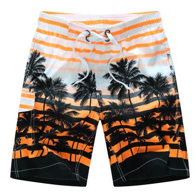 China Sustainable Mens Quick Dry Board Shorts Custom Logo Printed Palm Beach Swim Wear Shorts for sale