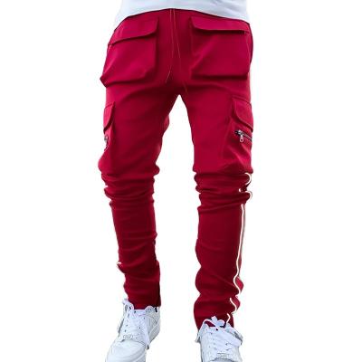 China Men's Empty Pants Breathable Gym Wear Joggers Running Casual Pants Plus Size Multi Pockets Sports Sweatpants Reflective Mens Pants for sale