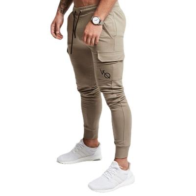 China New leisure muscle fitness brothers spring autumn pocket men's sports leisure exercise thin pants in Europe and America for sale