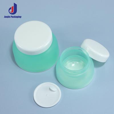 China Matte Green Cosmetic Jar Airless 50 Gm Cream Jar Empty With Lid for sale