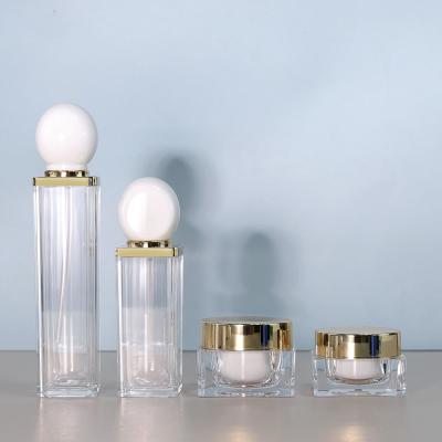 China Cosmetic Acrylic Bottles 30g 50g Plastic Lotion Bottles Packaging With Special Stone Cover Cap for sale