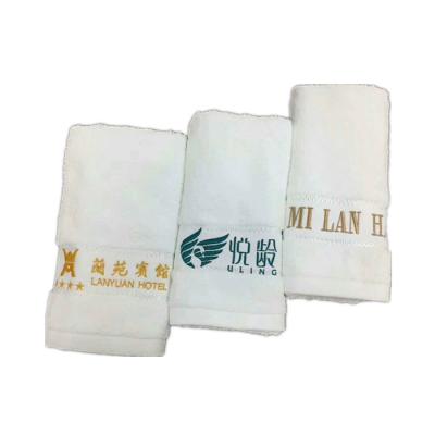 China Custom 100% Compressed Cotton Face Hand Bath Towel With Embroidery Logo for sale