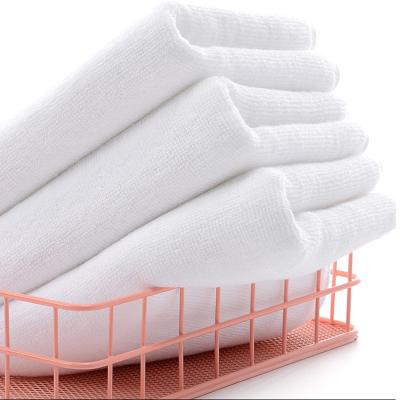 China Luxury Hotel Hypoallergenic Cotton Embroider Bath Towel Sets White Spa Logo Printed Hotel Towels Salon Custom Bath for sale