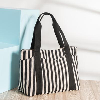 China Fashion Faster Zipper Top Striped Cotton Canvas Shoulder Heavy Handbag For Women With External Pocket for sale