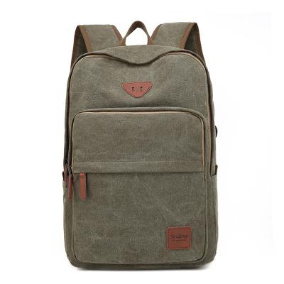 China New Durable Canvas Shoulder Travel Laptop Backpack School Book Backpack Waterproof School Backpack for sale