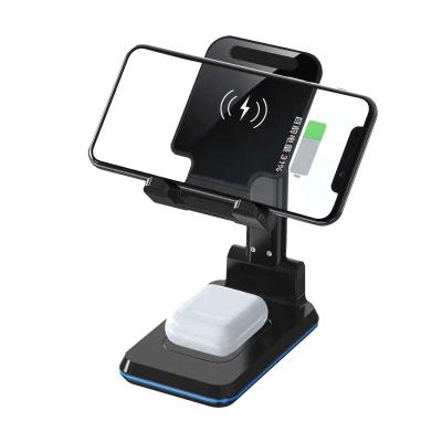 China Qi 2020 new 3 in 1 mobile phone desk stand foldable wireless charger double 10W wireless charger for sale