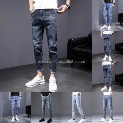 China Cheap fashion elastic tapered men's jeans slim fit small feet slim fit men's jeans men's pants viable for sale