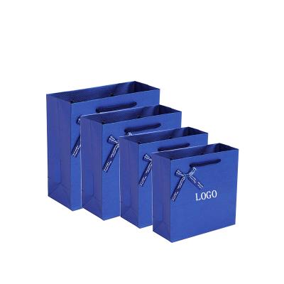 China Custom Recyclable High Quality Custom Blue Paper Bag Gift Shopping Bag With Bow Card Decorative Paper Bag for sale