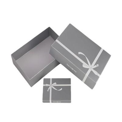 China Recycled Materials Wholesale Custom Valentine Foldable Cardboard Magnetic Storage Box With Ribbon Cosmetic Wedding Dress Gift Box Luxury Packaging for sale