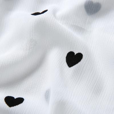 China New Design 100D Anti-Static Crepe Love Heart Flocking Chiffon Polyester Fabric Tulle Textile For Shirts And Wedding Dresses for sale