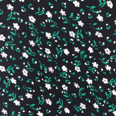 China Anti-Static Small Flowers And Leaves Printing 75D Polyester High Twist 100% Silk Like Fabric For Dress And Garment for sale