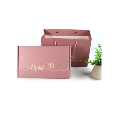 China New Arrival Simple Folding Handmade Clothes Shoe Packaging Box Custom Logo Corrugated Paper Gift Apparel Shipping Boxes for sale