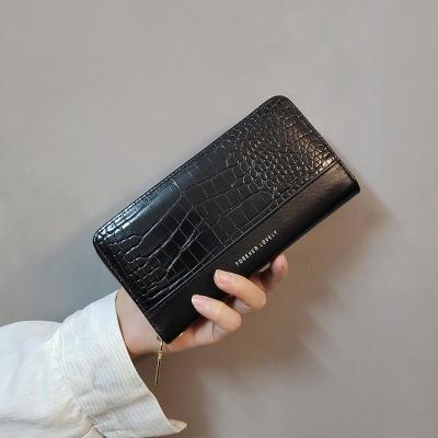 China NO New Crocodile Pattern Oil Wax Large Capacity Wallet Women Mobile Phone Lady Bags Zipper Long for sale