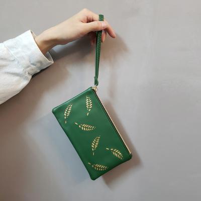 China NO Long Card Ball Hair Color Rivet Purse Wallet Ladies Purse Fashionable Pure Women Long Card Hollow Out Wallet for wom 2023 for sale