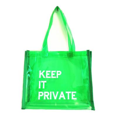 China Trendy Colorful Letter Printing Fashion Transparent Tote Bag Jelly Handbag Clear PVC Shopping Bag With Custom Logo for sale