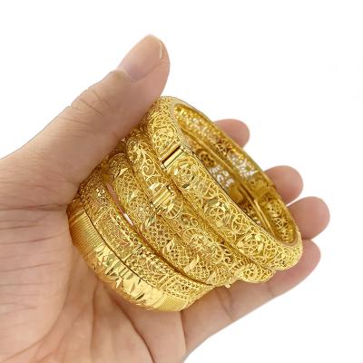 China CLASSIC Dubai America 24K gold plated retro embossed yellow color fashion charm open hollow cuff bangle bracelets for sale