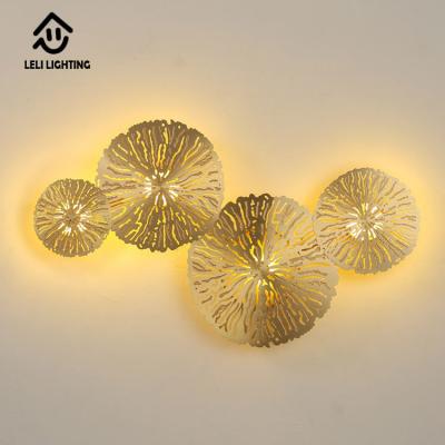 China Zhongshan post modern post modern interior decoration metal leaf wall lamp gold creative light for sale