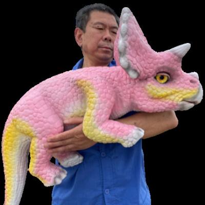 China Realistic Silicone Glue Dinosaur Baby Triceratops Hand Puppet Dinosaur Products for sale