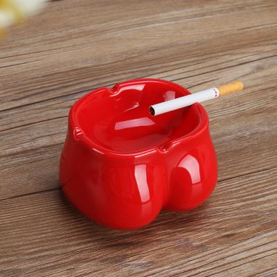 China Creative fashion high quality custom ceramic cigar ashtray custom made high quality ceramic chest kneeling hip cigar ashtray for sale