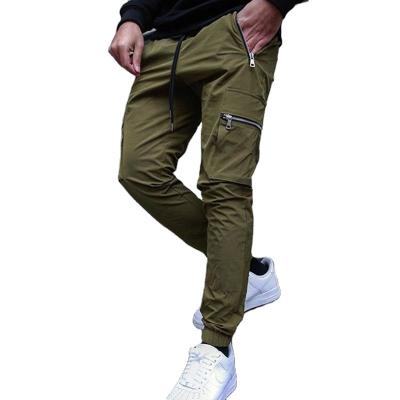 China Anti-wrinkle Men Track Pants New Style Solid Pants Training Sports Casual Zipper Pockets Pants for sale