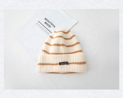 China Custom or wholesale acrylic rib winter beanie JOINT striped knitted hats for sale