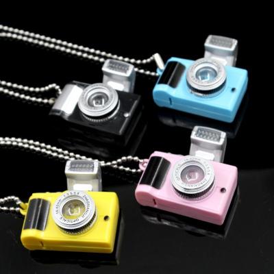 China Eco-friendly/Sustainable Daisy Led Sound Luminous Emitting Keyring Designer Camera Wild Keychain Creative Necklace Keychain Camera Keychain for sale