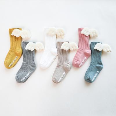 China New cute QUICK-DRY wings children's socks girls distributing non-slip baby socks In-tube boneless baby socks for sale