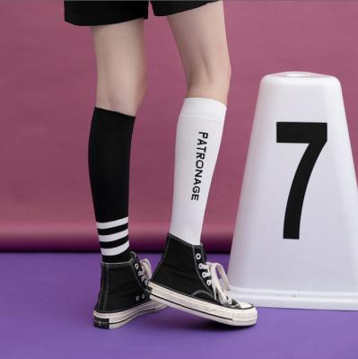 China New Arrival Breathable And Sweat-absorbent Ladies Knocks College Wind Letters Knee Socks Three Bars Contrast Color Ladies Socks for sale