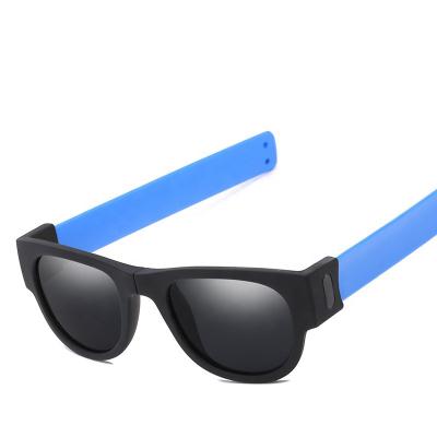 China Creative Portable UV400 Anti Sport Polarized Folding Sun Shade Folding Slap On Wristband Sunglasses Strap Slap Sunglasses for sale