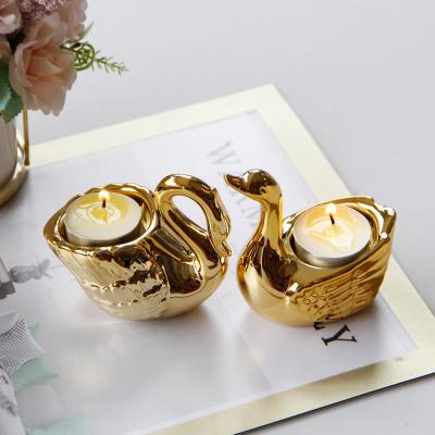 China New Delicate/Cheap/High Quality Hot-selling Gold Ceramic Candle Holder Swan Candle Holder in 2021 Suitable for Weddings and Gifts for sale