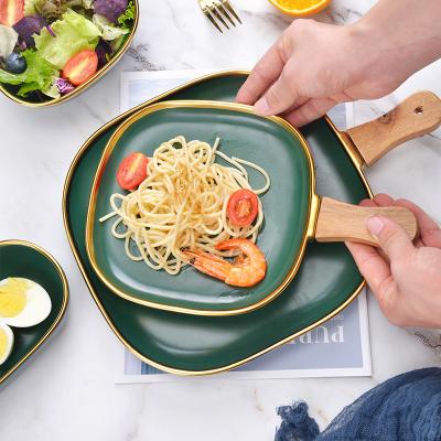 China Viable Designer Large Spoon Shaped Outline Ceramic Phnom Penh Dinner Dish Dinnerware Salad Cutlery Set for sale