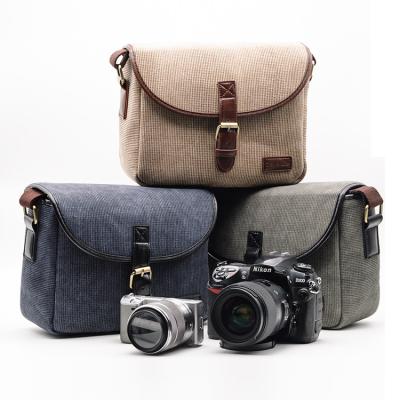 China Wholesale Protective Effects Vintage Women Waterproof Oxford Teens School Sling Insert DSLR Camera Bag For Girls for sale