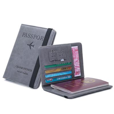 China 2021 Hot Selling Designer RFID Designer Purse Durable PU Holder Money Cards RFID Passport Leather Wallets for sale