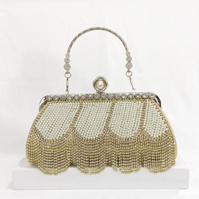 China New Design PU Rhinestone Tassel Small Even Gold Clutch Handbags Fashion Party Pearl Evening Clutch With Round Handle For Women for sale