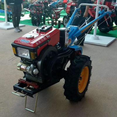 China Mini Farms 12hp 2 Wheel Hand Farm Walking Tractor With Tools For Agriculture for sale