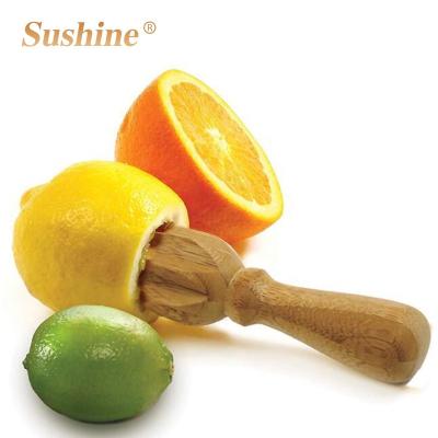 China Sustainable High Quality Bamboo Wooden Fruit Squeezer Hand Orange Squeezer for sale