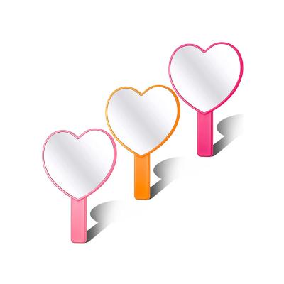 China OEM Factory Large Size Heart Shaped Handheld Cosmetic Pink Customized Portable Hand Mirror Pocket Mirror for sale