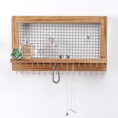 China FirWood Rustic Wooden Jewelry Hanging Rack with 32 Necklace Holders, Shelf, Earring Metal Mesh (17 x 10 x 4 in, Brown) for sale