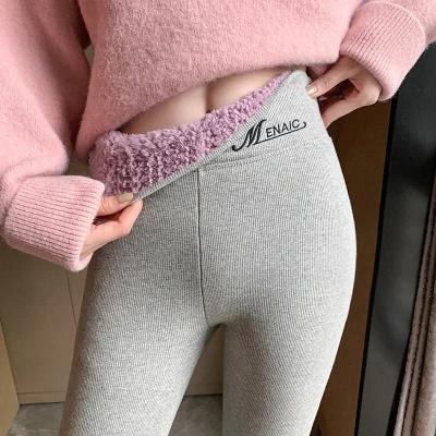 China Snagging Resistance In Stock Women Thick Waist Leggings Elastic Plush Thin Pants High Shear Striped Gaiters for sale