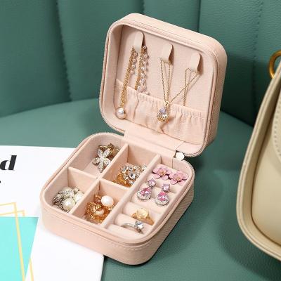 China Custom Luxury PU Leather Travel Jewelry Box Leather Packaging, Small Pink Fashion Gift Velvet Jewelry Case Organizer For Earring Necklace for sale