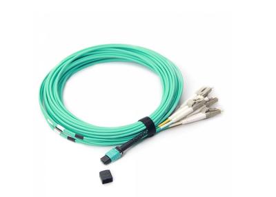 China 8 la base MTP-LC OM3 10G 50/125 construyó sólidamente el cable redondo de la chaqueta del cordón de remiendo de la fibra óptica de la distribución LSZH en venta