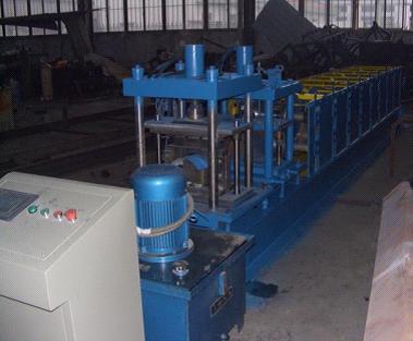 China Cap Ridge Roll Forming Machinery, Metal Roll Forming Machine with Hydraulic Station for sale